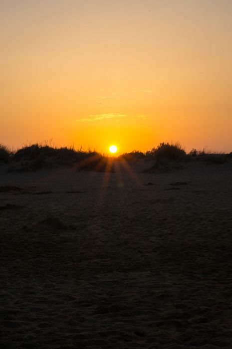 Sonnenuntergang am Strand                         