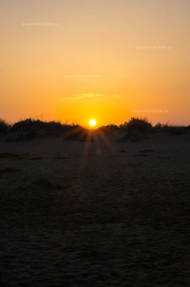 Sonnenuntergang am Strand                         